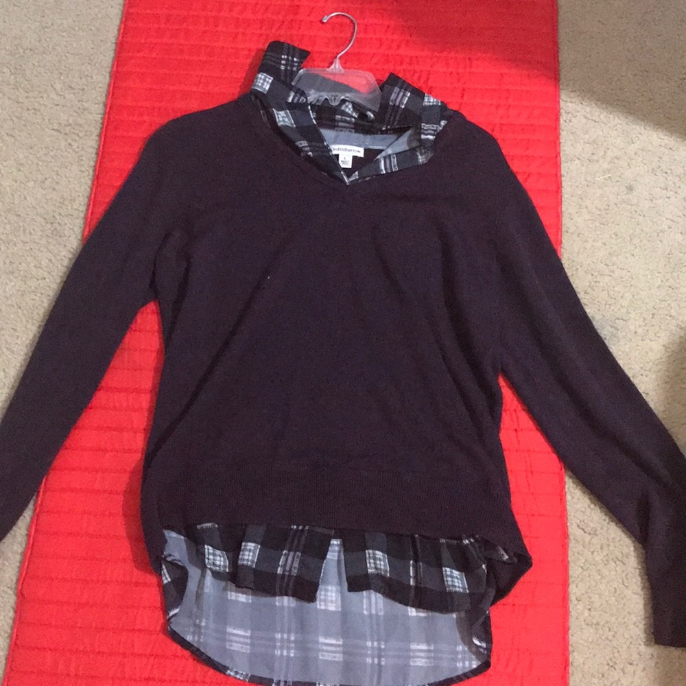 A purple sweater